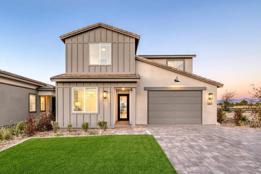 Front exterior of a new home in Terraza, San Tan Valley, AZ, highlighting curb appeal (Image 2). Front exterior of a new home in Terraza, San Tan Valley, AZ, highlighting curb appeal (Image 2).