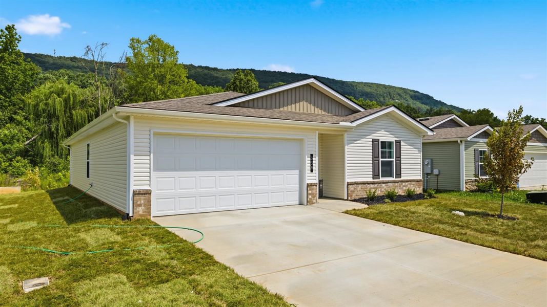 Front exterior of a new home in Emory Creek, Harriman, TN, highlighting curb appeal (Image 2).