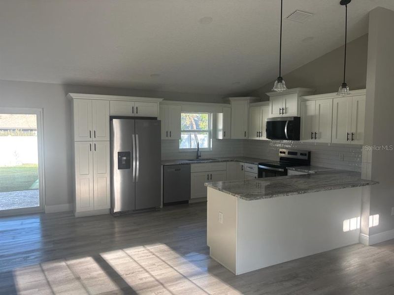 Furnished interior view inside a new home in , Dunnellon (Image 8).