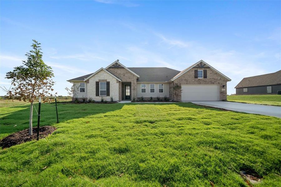 Front exterior of a new home in Fairview Meadows, New Fairview, TX, highlighting curb appeal (Image 21). Front exterior of a new home in Fairview Meadows, New Fairview, TX, highlighting curb appeal (Image 21).