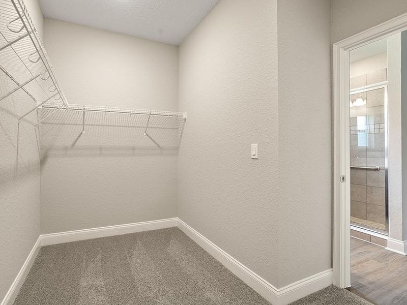 And, a walk-in closet provides storage convenience - Monroe 55+ by Highland Homes