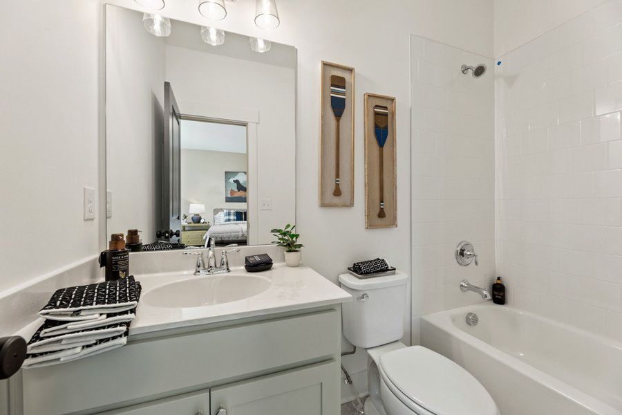 Representative furnished interior of a home built from the Belville by Peachtree Residential in Arden on Lanier, Cumming (Image 14).