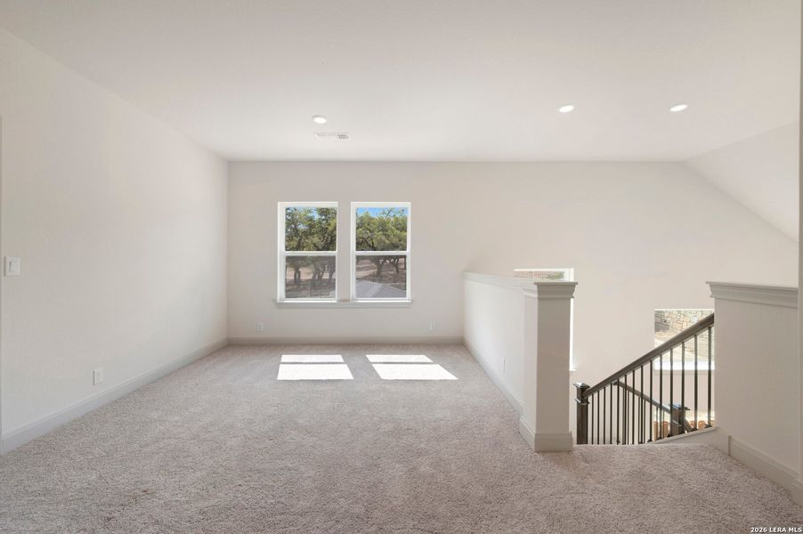 Spacious, unfurnished interior of a new home in Windsong - Legacy Series, Boerne (Image 21).