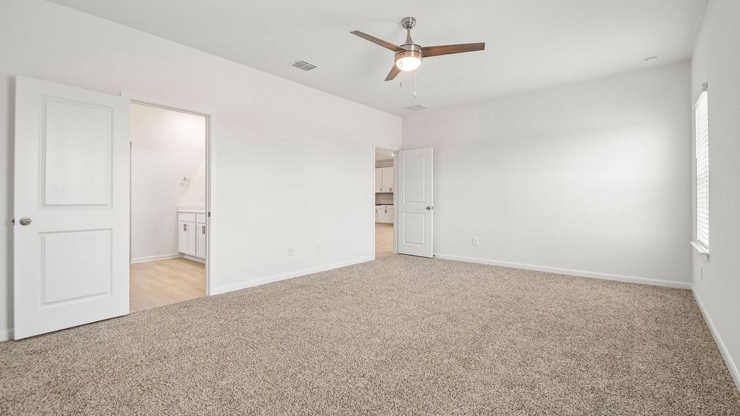 Spacious, unfurnished interior of a new home in Revelry, Del Valle (Image 25).