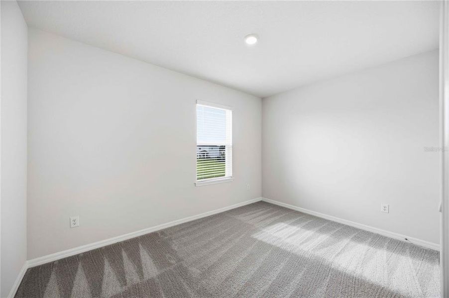 Spacious, unfurnished interior of a new home in Coddington, Bradenton (Image 51).