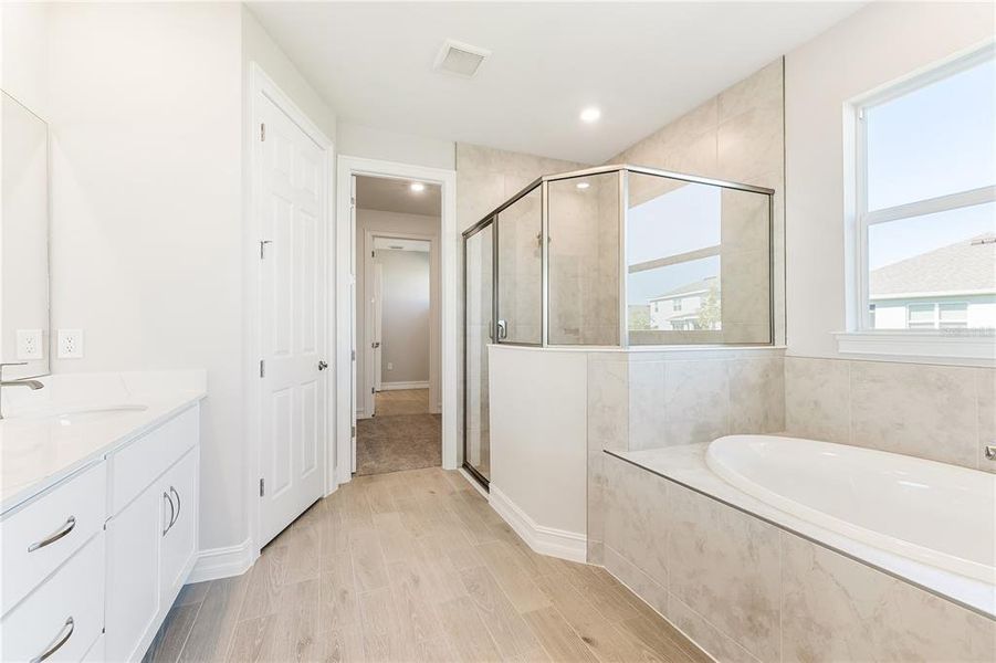 Furnished interior view inside a new home in Coral Lakes - Tradition & Express, Punta Gorda (Image 11).