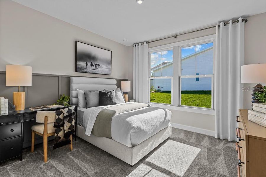 Furnished interior view inside a new home in The Cypress Series at Reserve East, Flagler Beach (Image 8).