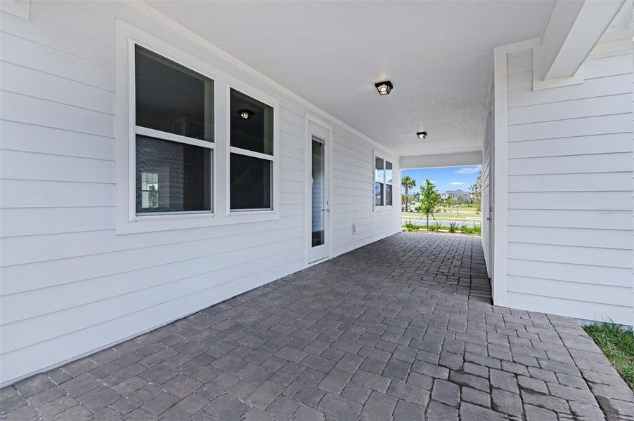 Front exterior of a new home in Weslyn Park, St. Cloud, FL, highlighting curb appeal (Image 25).