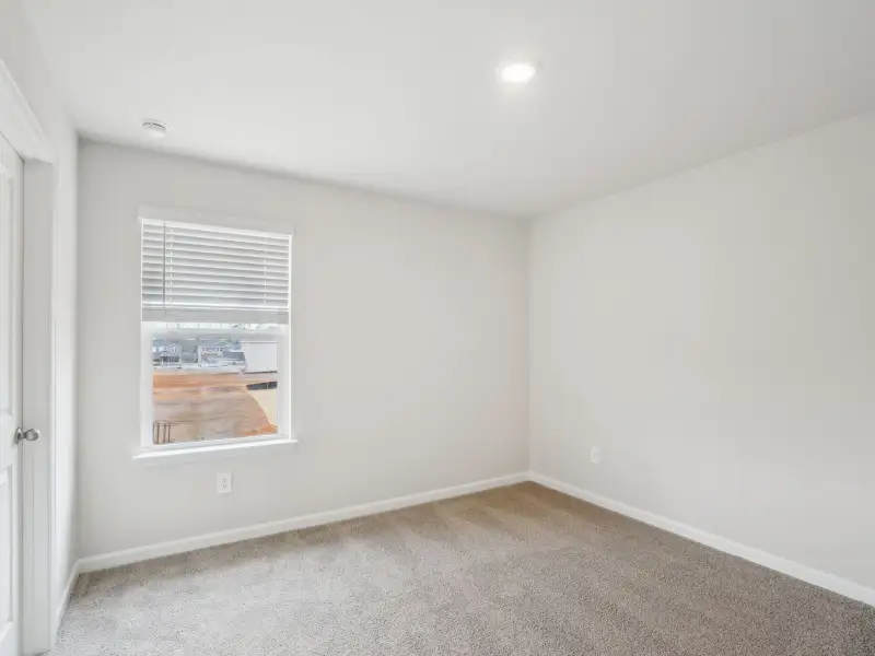 Spacious, unfurnished interior of a new home in Martin Springs - Cottage Series, Lawrenceville (Image 19).
