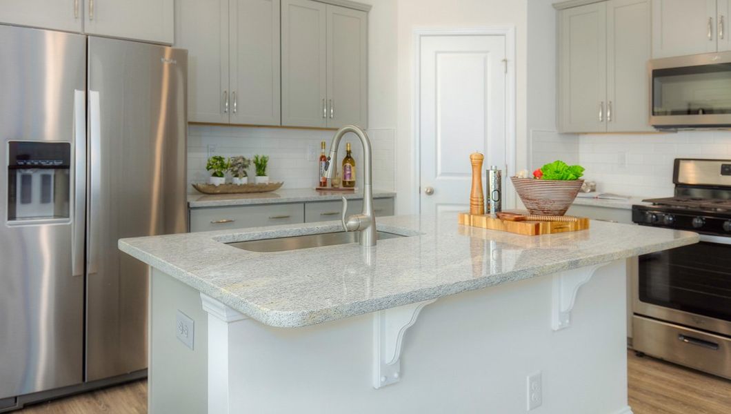 Furnished interior view inside a new home in Townes at Tap Root Farms, Fletcher (Image 10). Furnished interior view inside a new home in Townes at Tap Root Farms, Fletcher (Image 10).
