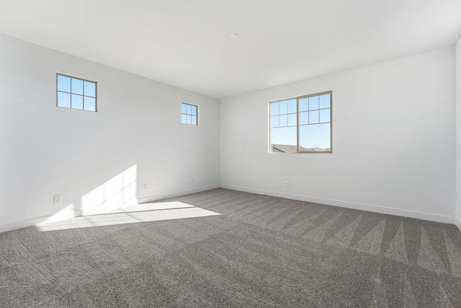 Spacious, unfurnished interior of a new home in Ellsworth Ranch, Queen Creek (Image 37).