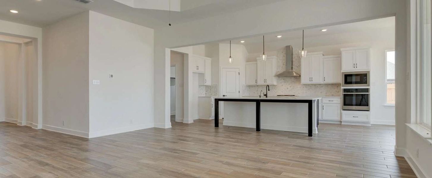 Image 23 representing the Ellington by Ashton Woods in Megan's Landing 70's, Castroville, TX.