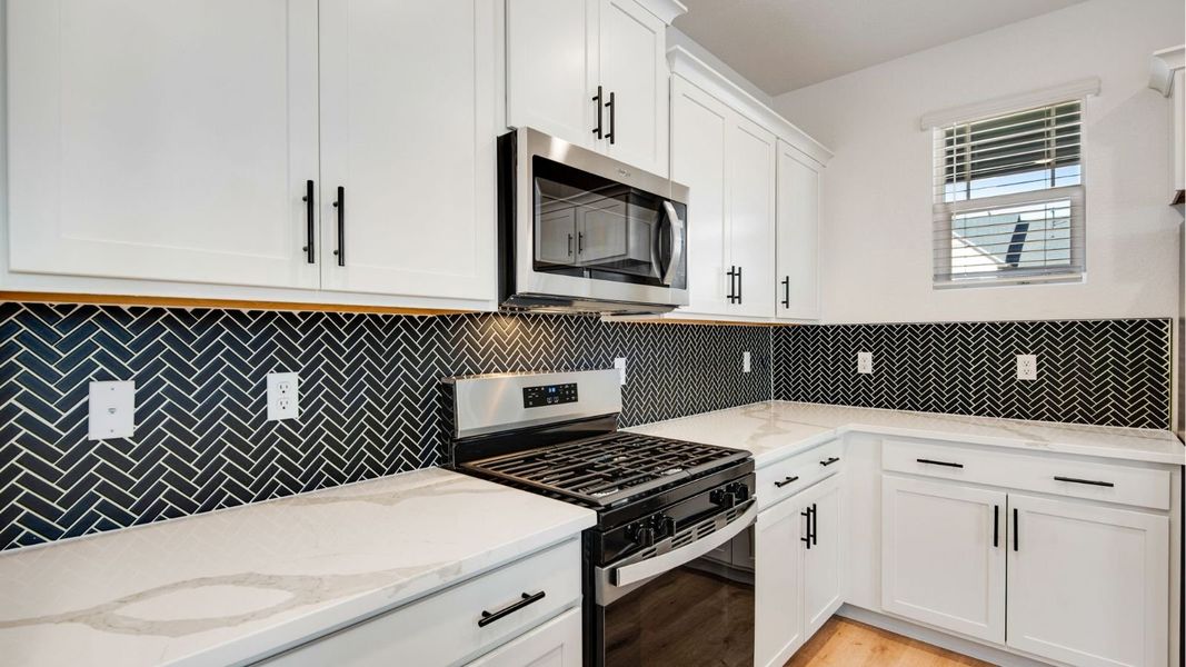 Furnished interior view inside a new home in Horizon Uptown, Aurora (Image 8).