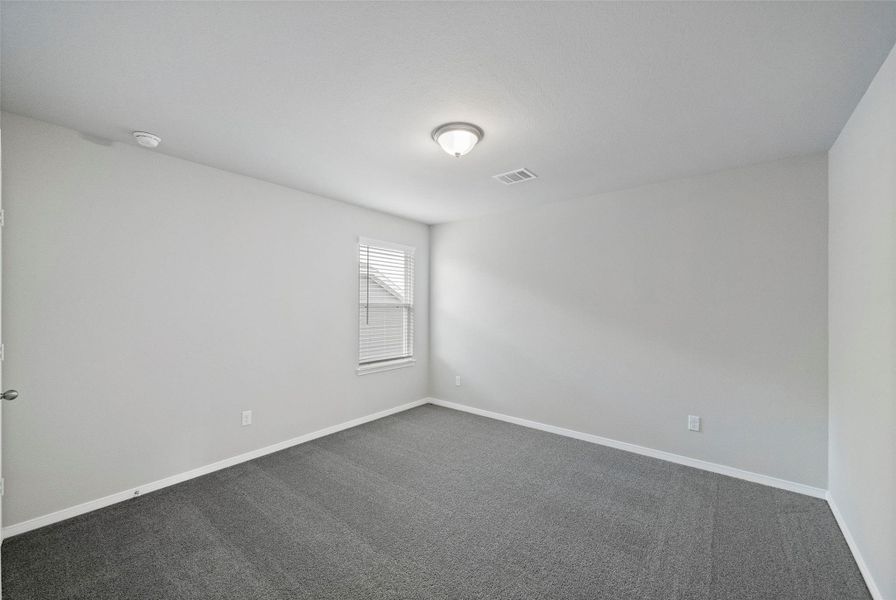 Spacious, unfurnished interior of a new home in Sunterra, Katy (Image 19).