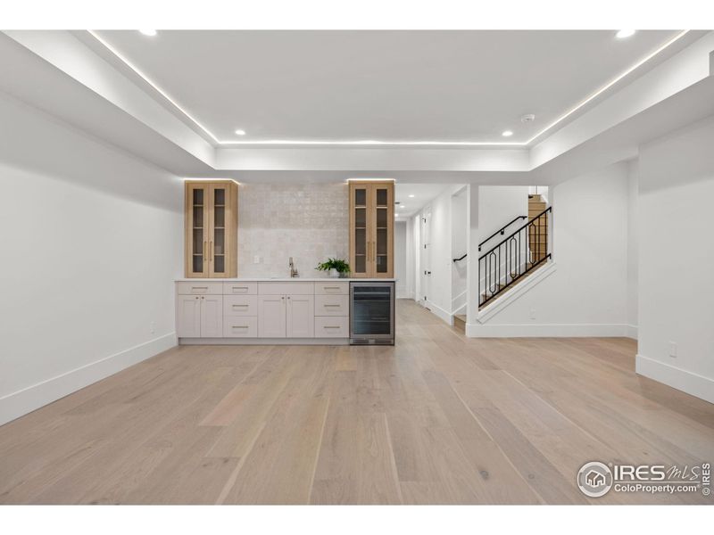 Family Room in Finished Basement with Private Access Door with Lock Off