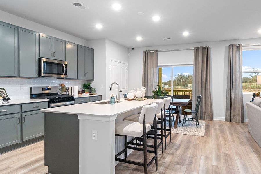 A kitchen with a large island. A kitchen with a large island.