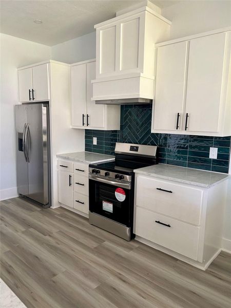 Furnished interior view inside a new home in , Conroe (Image 5).