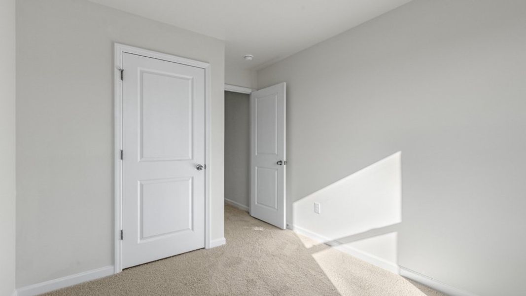 Spacious, unfurnished interior of a new home in The Townes at Honeycutt Oaks, Angier (Image 20). Spacious, unfurnished interior of a new home in The Townes at Honeycutt Oaks, Angier (Image 20).