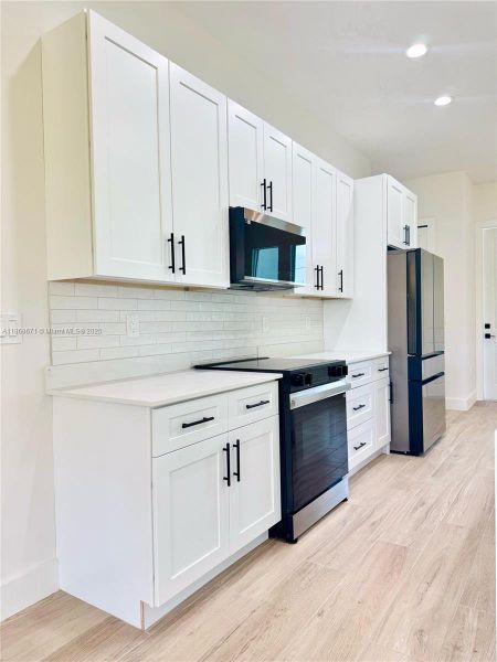 Furnished interior view inside a new home in , Rotonda West (Image 12).