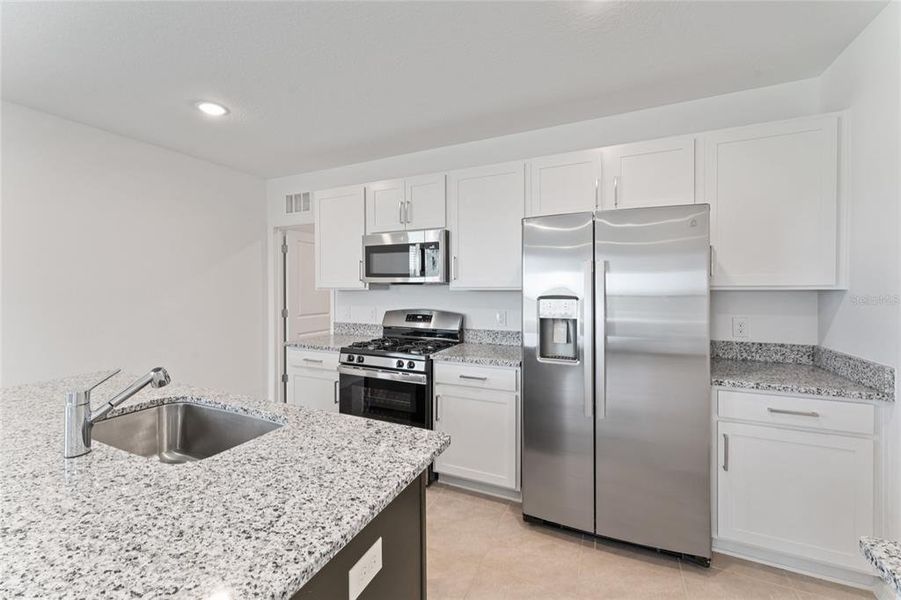 Furnished interior view inside a new home in , Winter Garden (Image 5).