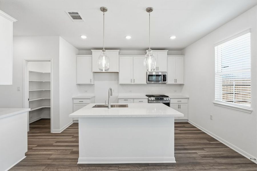 Furnished interior view inside a new home in Lisso, Pflugerville (Image 4).