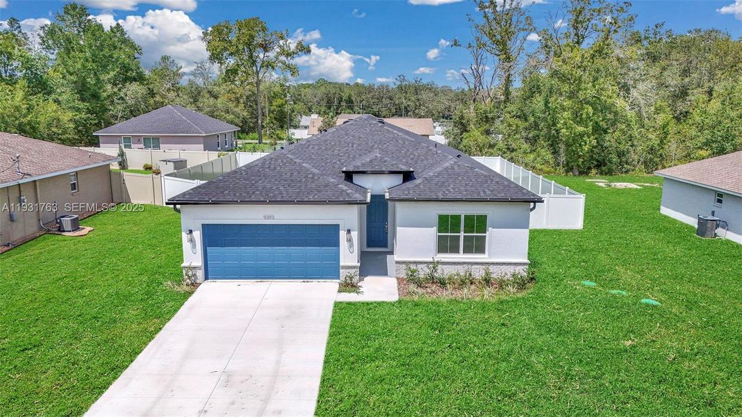 Front exterior of a new home in , Summerfield, FL, highlighting curb appeal (Image 1). Front exterior of a new home in , Summerfield, FL, highlighting curb appeal (Image 1).
