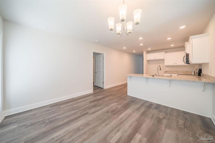 Representative unfurnished interior of a home built from the Plan 1317 by Adams Homes in Turtle Creek, Cantonment (Image 16). Representative unfurnished interior of a home built from the Plan 1317 by Adams Homes in Turtle Creek, Cantonment (Image 16).