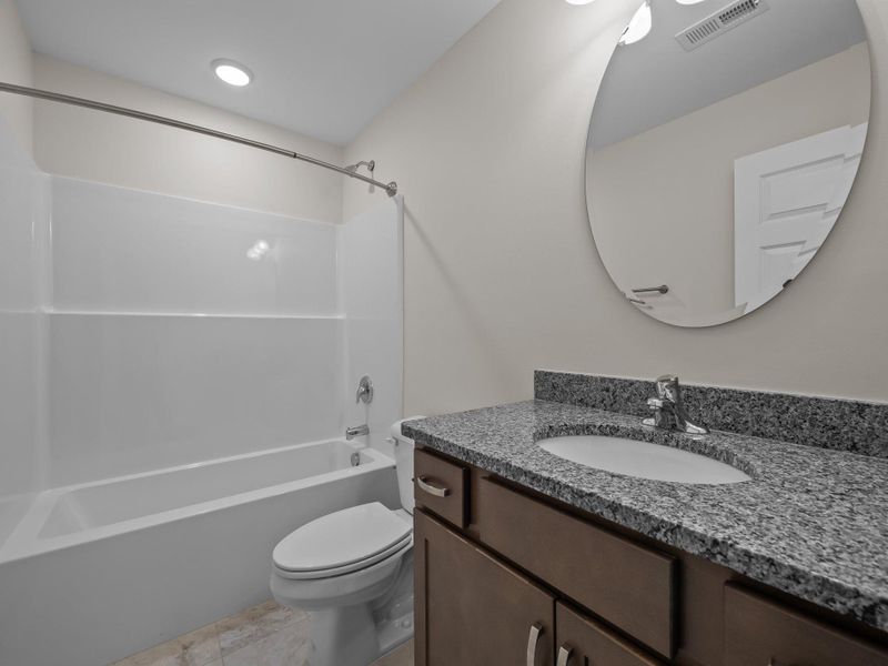 Representative furnished interior of a home built from the Pamlico A by JC Jackson Homes,LLC in Heritage Pointe, Newport (Image 9).