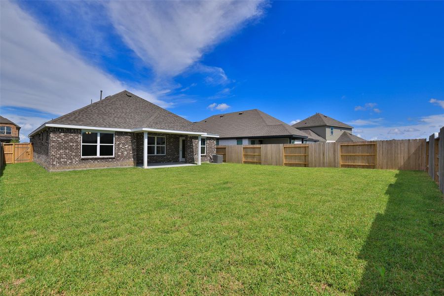 Exterior details and patio area of a home in River Ranch, Dayton (Image 2). Exterior details and patio area of a home in River Ranch, Dayton (Image 2).