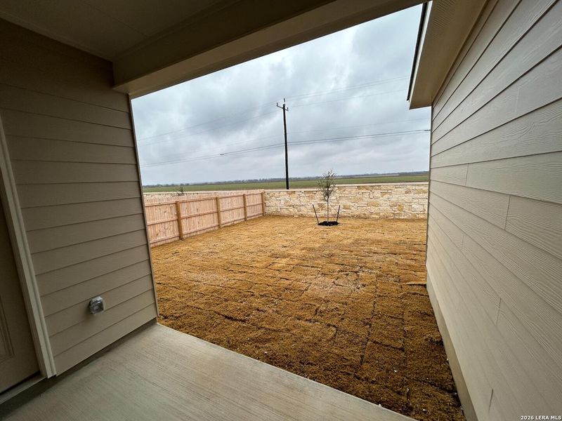 Exterior details and patio area of a home in Hennersby Hollow, San Antonio (Image 22).