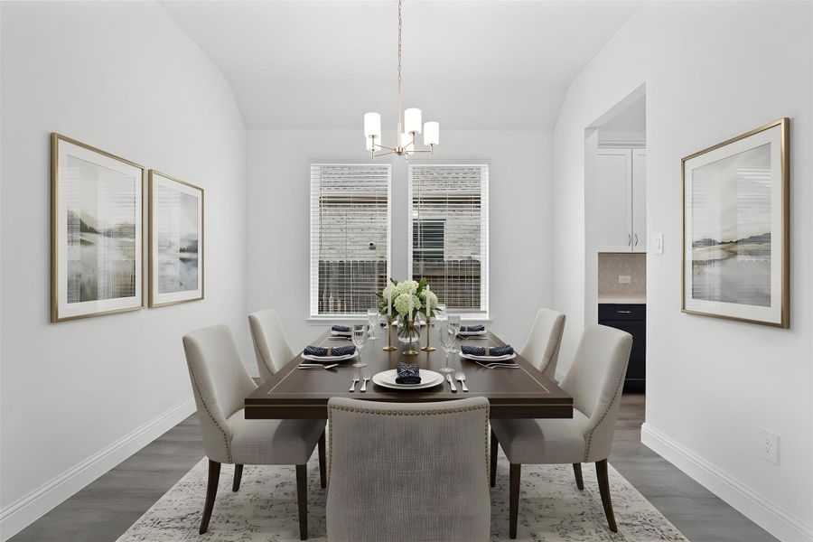 You and your guests will certainly dine in style in this amazing formal dining room! Featuring a gorgeous modern chandelier, large window with blinds, neutral paint, high ceilings, and luxury vinyl flooring! Perfect space to entertain family and friends! *Virtually Staged You and your guests will certainly dine in style in this amazing formal dining room! Featuring a gorgeous modern chandelier, large window with blinds, neutral paint, high ceilings, and luxury vinyl flooring! Perfect space to entertain family and friends! *Virtually Staged