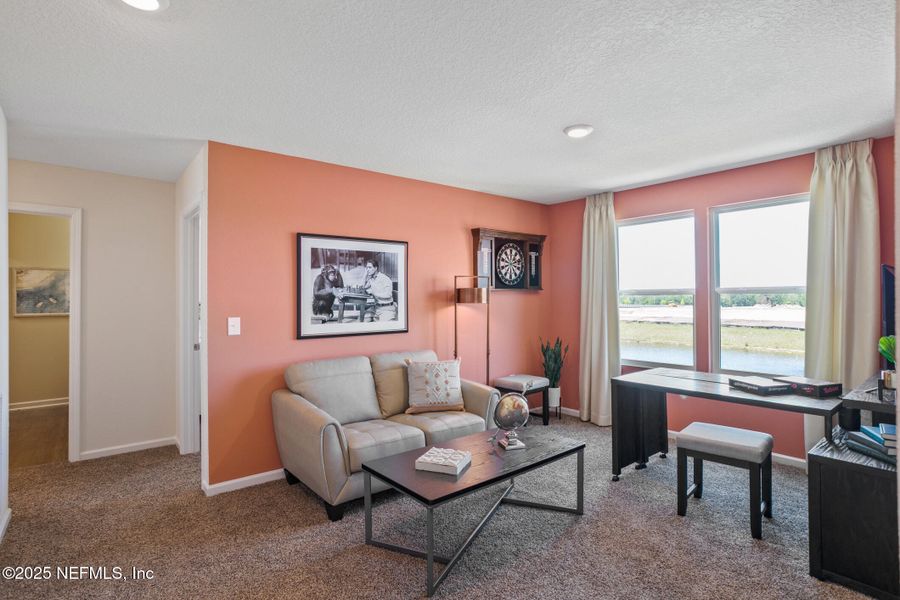 Furnished interior view inside a new home in Sawmill Branch, Palm Coast (Image 25).