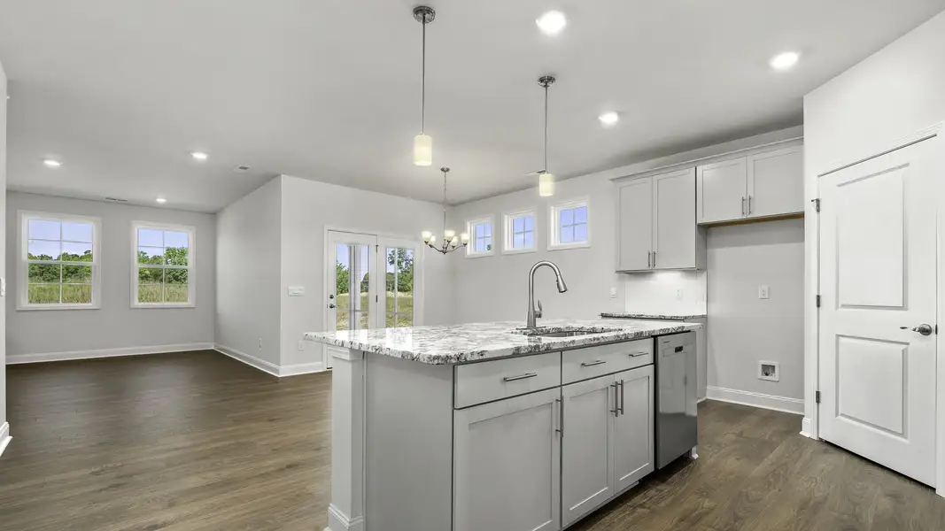 Furnished interior view inside a new home in The Villas at Kinsley, Jamestown (Image 3).