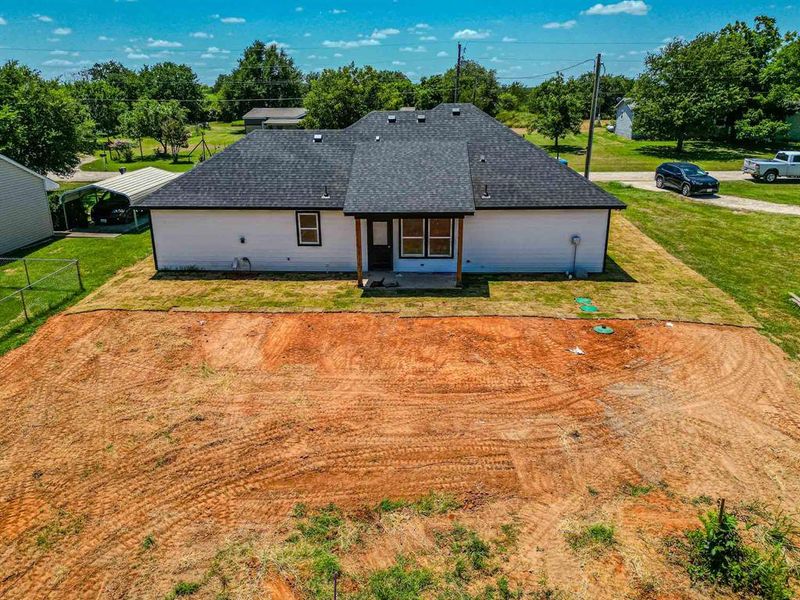 Back of property with roof with shingles Back of property with roof with shingles