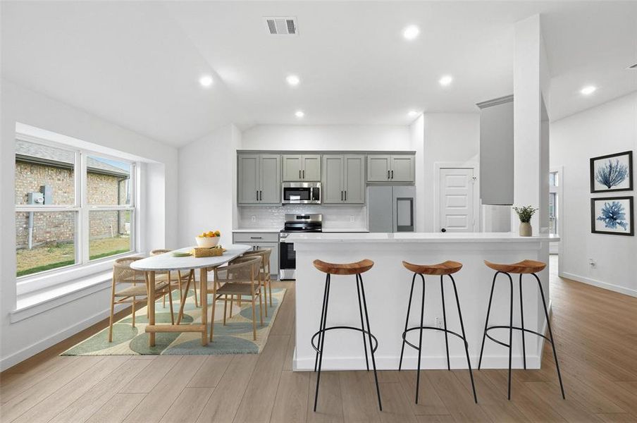 Virtually Staged kitchen and dining nook Virtually Staged kitchen and dining nook
