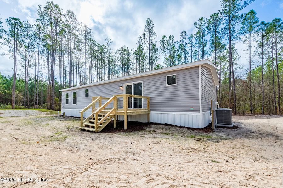 Exterior details and patio area of a home in , Lake Butler (Image 18).