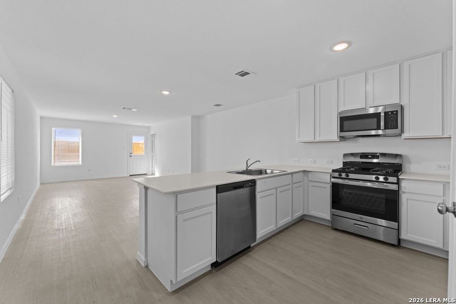 Furnished interior view inside a new home in Espada, San Antonio (Image 4).