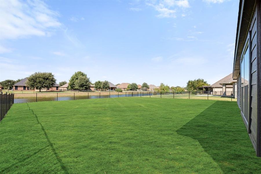 Exterior details and patio area of a home in Abe's Landing, Granbury (Image 4).