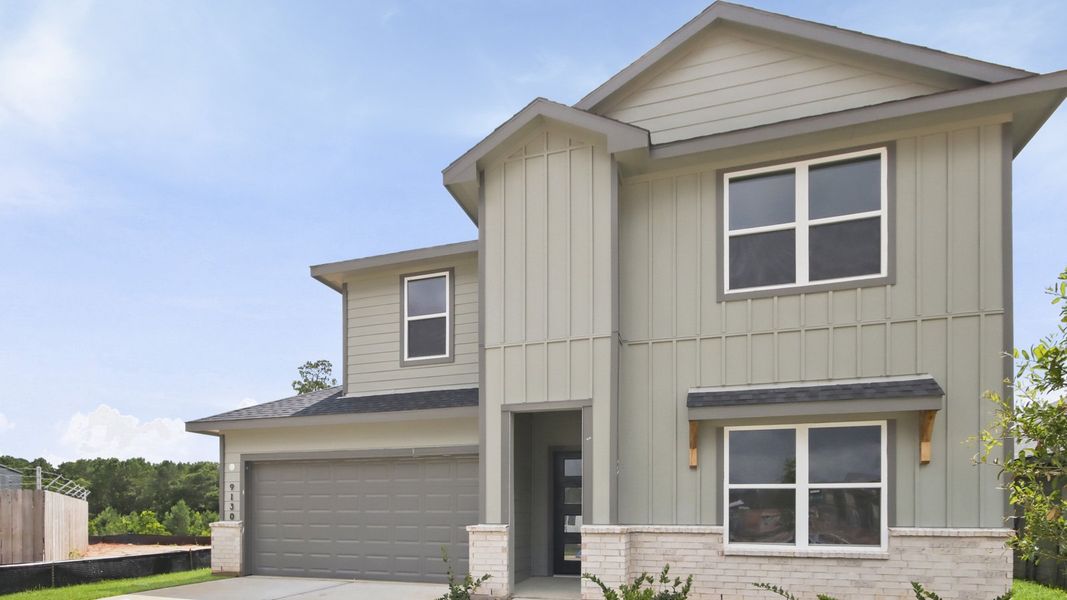 Front exterior of a new home in Chapel Lakes, Montgomery, TX, highlighting curb appeal (Image 23).