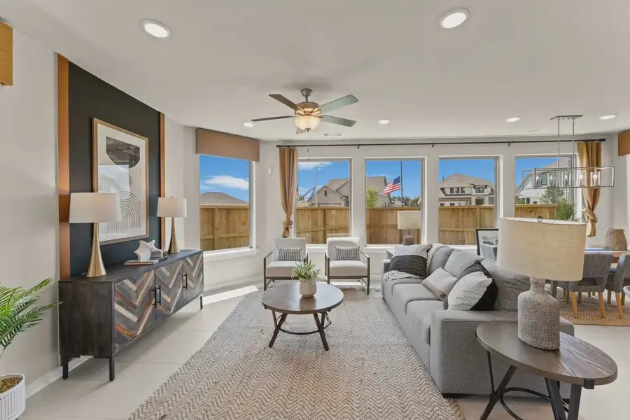 Representative furnished interior of a home built from the Capeside by Chesmar Homes in Meridiana Courtyard Collection, Manvel (Image 4).