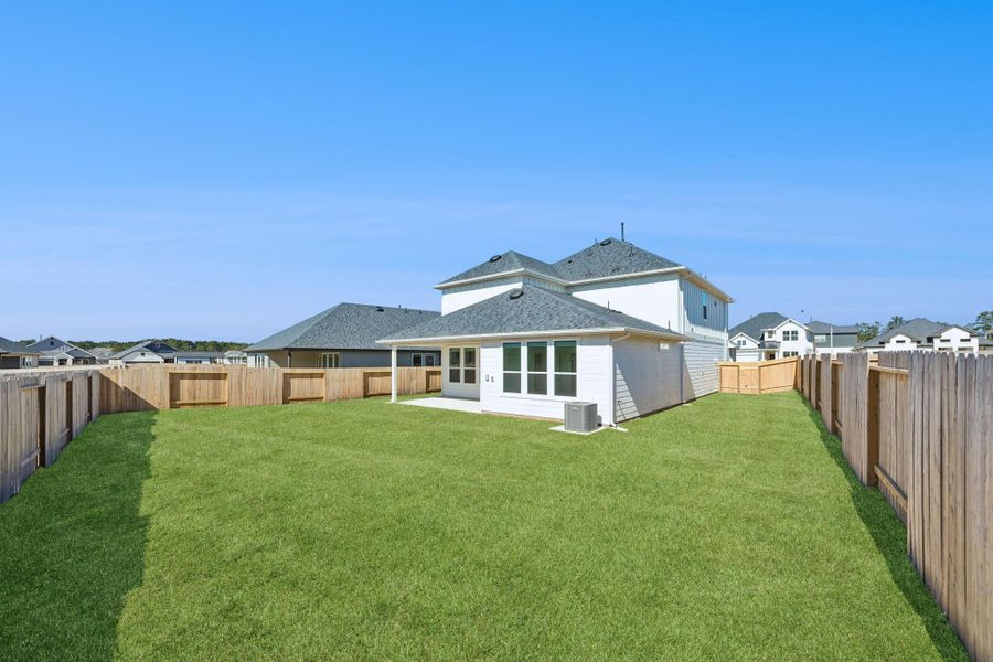 Exterior details and patio area of a home in Montgomery Bend, Montgomery (Image 4).