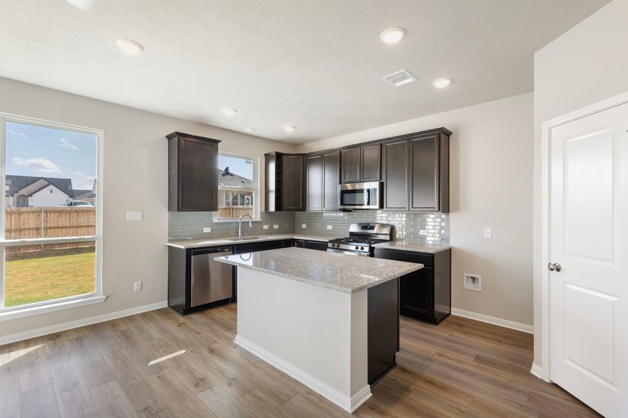 Representative furnished interior of a home built from the The 1613 by Stylecraft Builders in Arroyo Ranch, Seguin (Image 7).