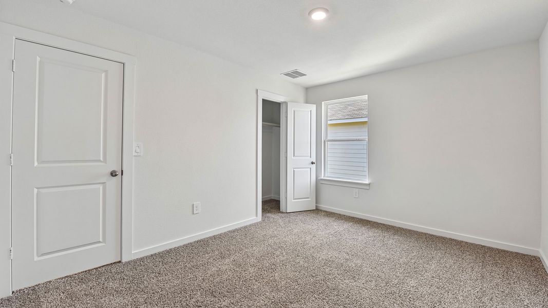 Spacious, unfurnished interior of a new home in Monarch Ranch, Manor (Image 38).