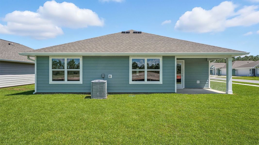 Front exterior of a new home in Palmetto Bluff, Port Saint Joe, FL, highlighting curb appeal (Image 19). Front exterior of a new home in Palmetto Bluff, Port Saint Joe, FL, highlighting curb appeal (Image 19).