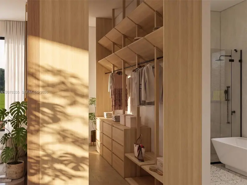 Sunlit bathroom with wood slat accents, walk-in shower, and spa-inspired ambiance.