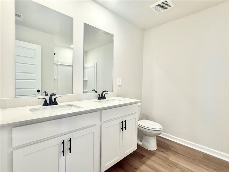 Furnished interior view inside a new home in Vines at Mill Creek - Estate Series, Braselton (Image 12). Furnished interior view inside a new home in Vines at Mill Creek - Estate Series, Braselton (Image 12).