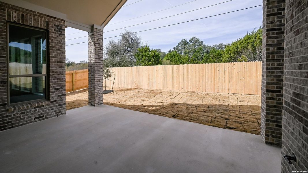 Exterior details and patio area of a home in Kinder Ranch, San Antonio (Image 4).