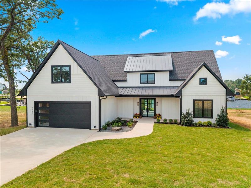 Front exterior of a new home in , Tool, TX, highlighting curb appeal (Image 2). Front exterior of a new home in , Tool, TX, highlighting curb appeal (Image 2).