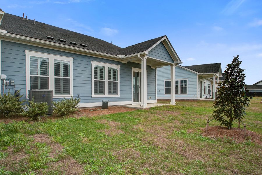 Exterior details and patio area of a home in Carnes Crossroads, Summerville (Image 3). Exterior details and patio area of a home in Carnes Crossroads, Summerville (Image 3).