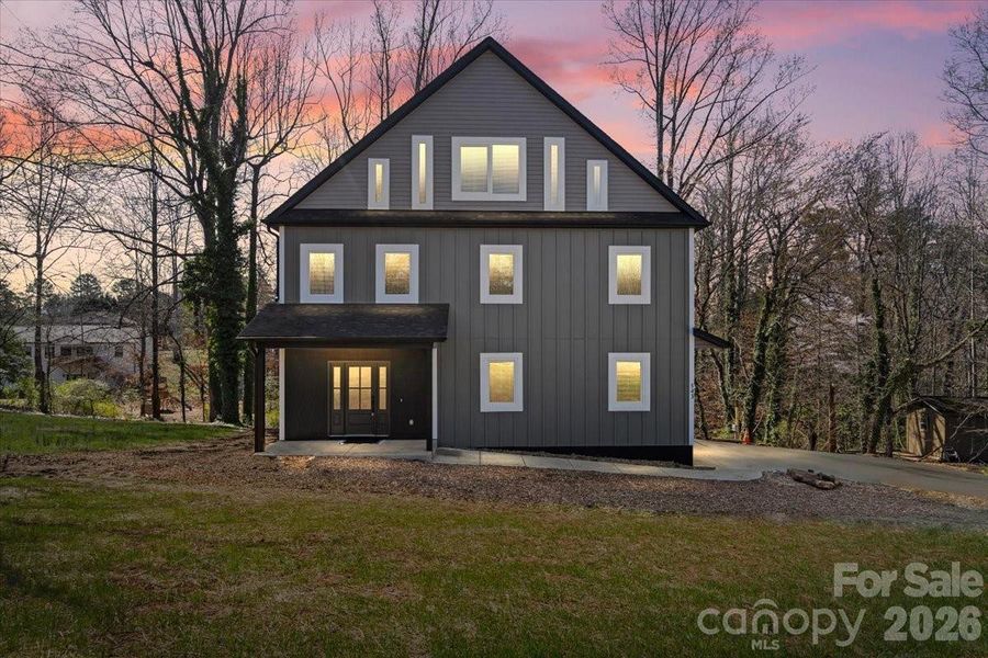 Front exterior of a new home in , Hickory, NC, highlighting curb appeal (Image 25).
